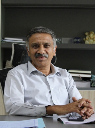 Dr. Ganesh K